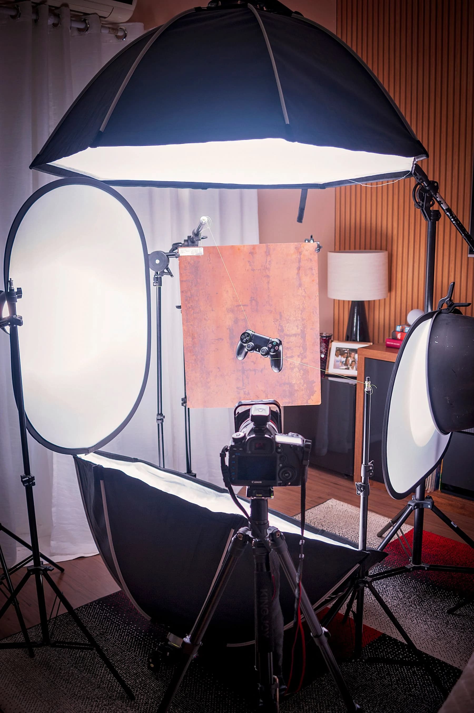 Photography lights and reflector arranged for a product shoot